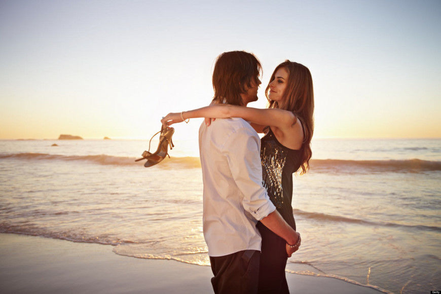 Young couple embracing on beach